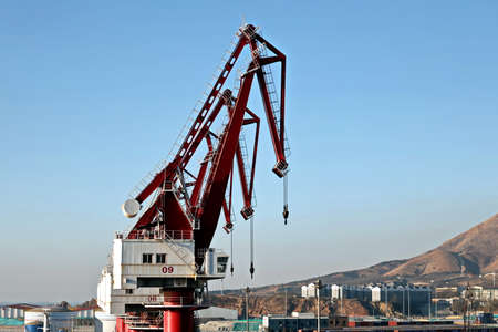 View of onshore harbor cranes and their structures in the port of Huludao, China.