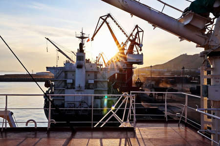 Various sunset views of the docks, piers, terminal of the Port of Huludao, China.の写真素材