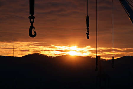 Various sunrise views of the piers, terminal and coastline of the Port of Vostochnyy. Russia, December, 2020の写真素材