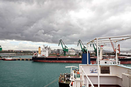 Views of the terminals, piers, cranes and various equipments in port of Cigading. Indonesia,...