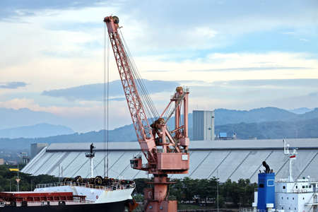 Views of the terminals, piers, cranes and various equipments in port of Cigading. Indonesia,...