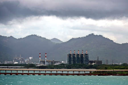 Various panoramic views of the coastline, piers and terminals of Port of Cigading, Indonesia,...