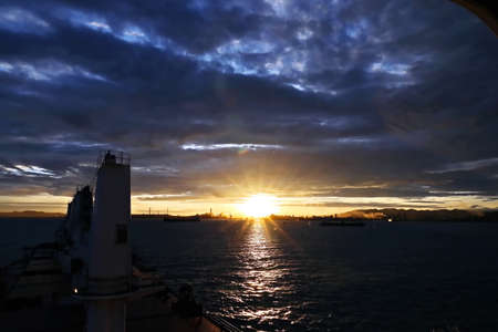 Various view of the coastline, piers and terminal during the sunrise & sunset. Indonesia, December,...