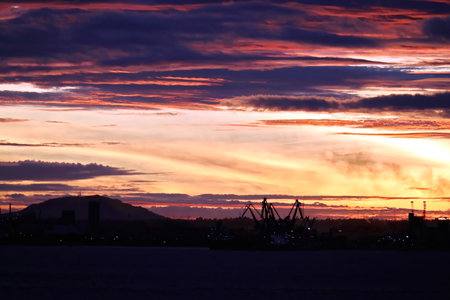 Various view of the coastline, piers and terminal during the sunrise & sunset. Indonesia, December, 2020の写真素材