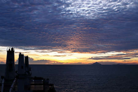 Various view of the coastline, piers and terminal during the sunrise & sunset. Indonesia, December, 2020の写真素材