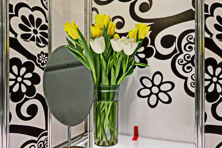 Beautiful blooming tulip flowers on background of green plants in the summer home garden. Odessa, Ukraine.の写真素材