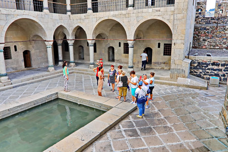 Khertvisi, Georgia 31, July, 2019 . Tourists the visiting sights of the fortress, buildings and castle of Khertvisi.のeditorial素材