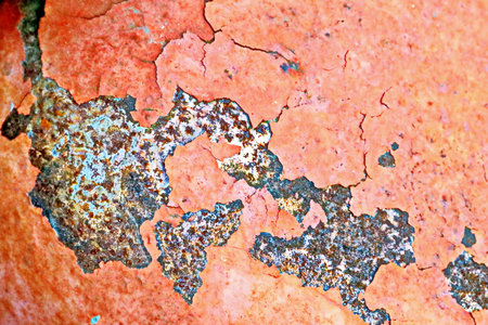 rusty metal background with peeling paint, closeup of photoの写真素材