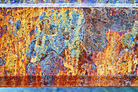 abstract background of rusty metal plate with streaks of rust and corrosionの写真素材