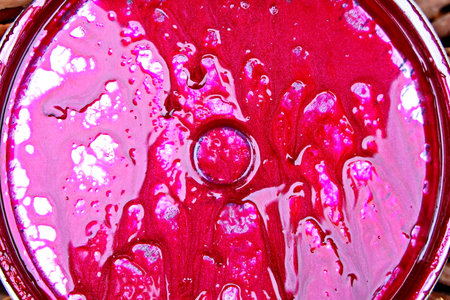 Water drops on a jar of red wine. close-up.の写真素材