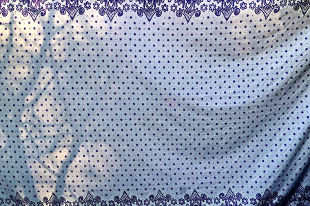 Fabric with lace pattern as a background, closeup of photoの写真素材