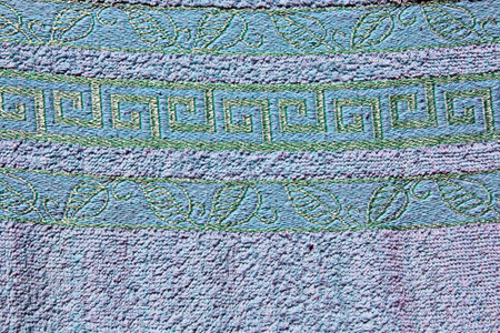 The texture of the wall is covered with multi-colored paint.