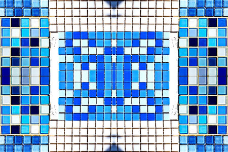 abstract background of blue mosaic tiles on the facade of the building