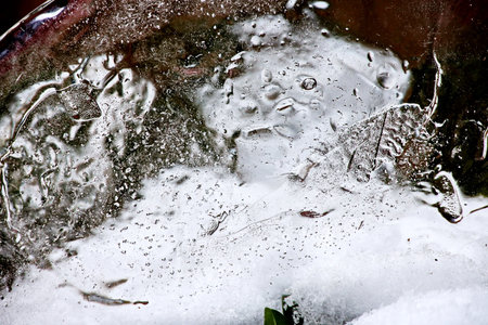 ice on the window close-up, natural background, macro photoの写真素材