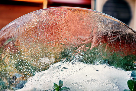 Close up of ice on the glass of a cafe. selective focus.の写真素材