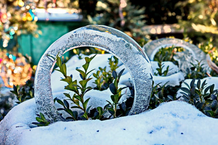 Ice sculpture in the garden at winter time. Shallow depth of field.の写真素材