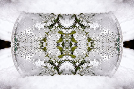 Frozen glass vase on the snow in the winter forest.の写真素材