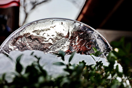 Reflection in the mirror of a cafe in the snow, winterの写真素材