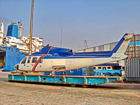 Helicopter on a trailer in a shipyard, closeup of photoの写真素材