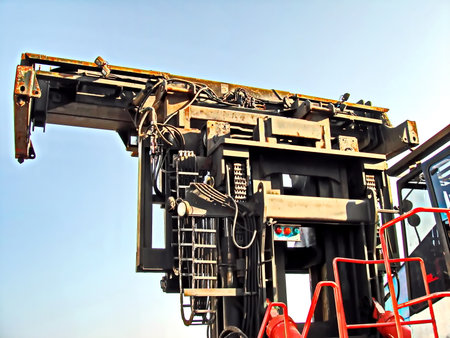 Detail of a part of a large industrial crane, closeup of photo