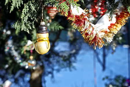 Christmas decoration on the Christmas tree in the form of a bell.の写真素材