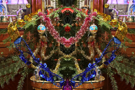 Colorful Christmas ornaments on a Christmas tree in a shopの写真素材