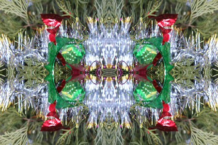 Christmas tree decorated with red and green baubles and tinselの写真素材