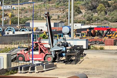 Industrial construction site with crane and excavator. Industrial background.
