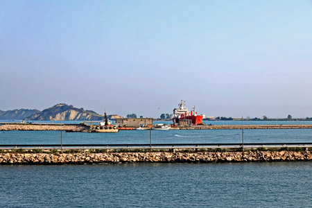 Cargo ship in the port of Alghero, Sardiniaの写真素材