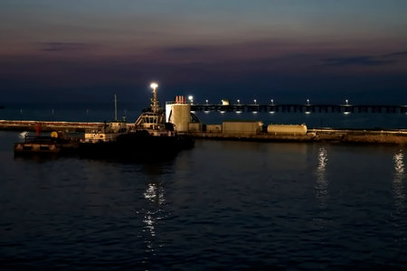 Lighthouse in the port at night, Crete, Greece.の写真素材