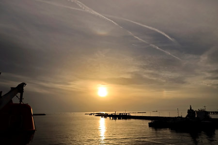 Sunset on the sea. Sunset in the sea. The sun goes down.の写真素材