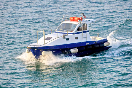 Pilot on the boat in the sea, closeup of photoの写真素材