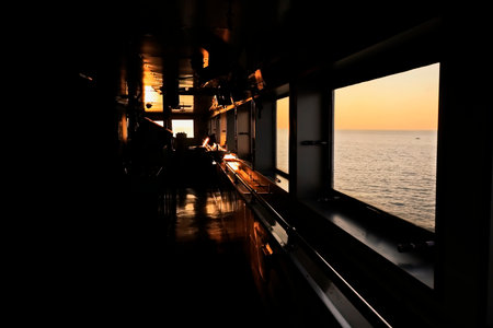 View of the sea from the ship window at sunset, Thailand.