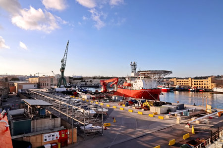 Cranes and ships in the port of Genoa, Italyの写真素材
