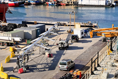 Cargo terminal for loading bulk cargo by ship cranes and grabs. Views of the piers, vessels and terminal for loading bulk cargo by ship cranes and grabs.の写真素材