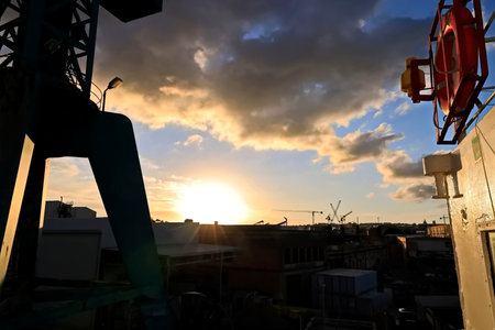Sunset in the port of Genoa, Liguria, Italyの写真素材