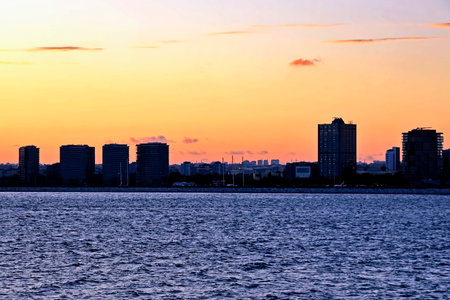 Sunset over the sea and the city of Rostov-on-Donの写真素材
