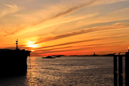 Silhouette of a ship in the sea at sunset, silhouette of a shipの写真素材