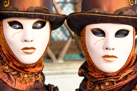 Two beautiful brown masks in Venice, Italy.の写真素材