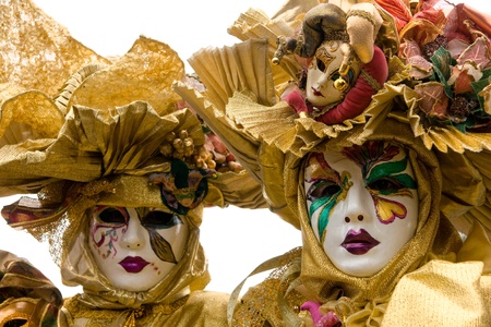Two golden mask in Venice, Italy.の写真素材