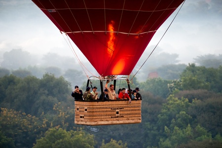 BAGAN - NOVEMBER 29,: Tourist in an Hot Air Balloon over the plain of Bagan, an ancient city in the...