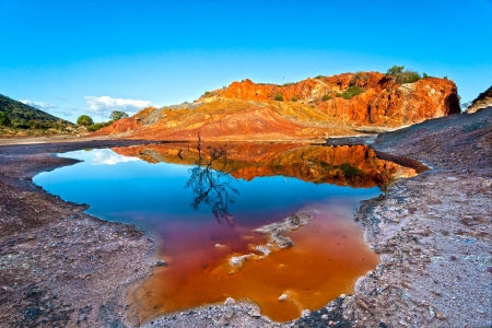 Small mineral lake in Rio Marina, Elba Island, Italy.の写真素材