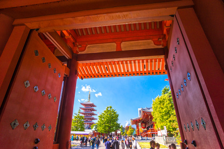 TOKYO-NOVEMBER 13: Tourists visit Senso-ji Temple on November 13, 2014 in Tokyo, Japan. The Senso-ji Buddhist Temple is the symbol of Asakusa and one of the most famous temples of Japan.のeditorial素材