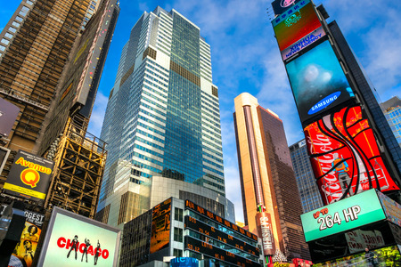 NEW YORK CITY - DEC 01 Times Square ,is a busy tourist intersection of neon art and commerce and is an iconic street of New York City and America, December 01th, 2013 in Manhattan, New York City.のeditorial素材