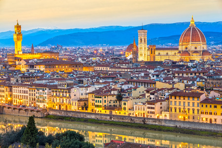 Cathedral of Santa Maria del Fiore and Palazzo Vecchio at sunrise, Florence, Italyの写真素材