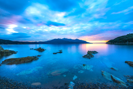 Wonderful sunset on Enfola Beach, Portoferraio, Elba Island, Italyの写真素材
