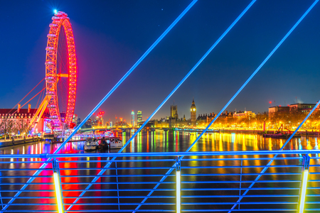 Thge Big Ben and the London Eye, view from golden jubilee bridge, London, UKのeditorial素材