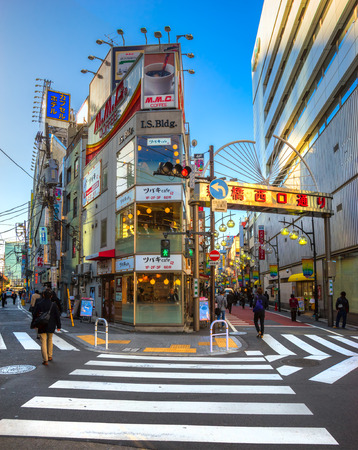 TOKYO, JAPAN - NOVEMBER 16, 2014: Strett life of the Minato-Ku area, colse to Shinbashi JR station.のeditorial素材