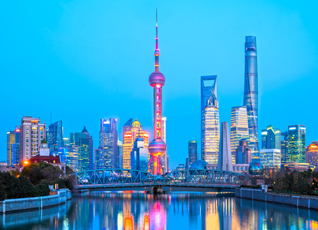 Shanghai city skyline, view of the skyscrapers of Pudong and Waibaidu bridge from huangpu River. China.の写真素材