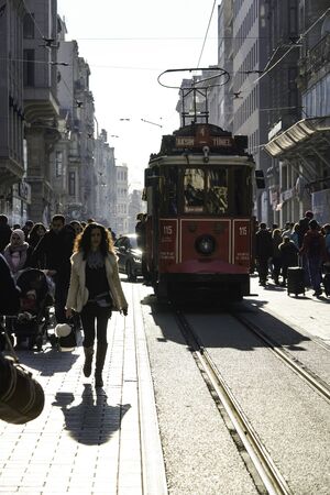 ISTANBUL, TURKEY - DECEMBER 28, 2018: Peoples walking in Taksim Istiklal Street. Taksim Istiklal Street is a popular destination in Istanbul. Beyoglu, Taksim, Istanbul. Turkey.のeditorial素材